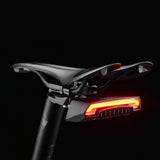 ROCKBROS rear bike light installed on saddle for nighttime safety