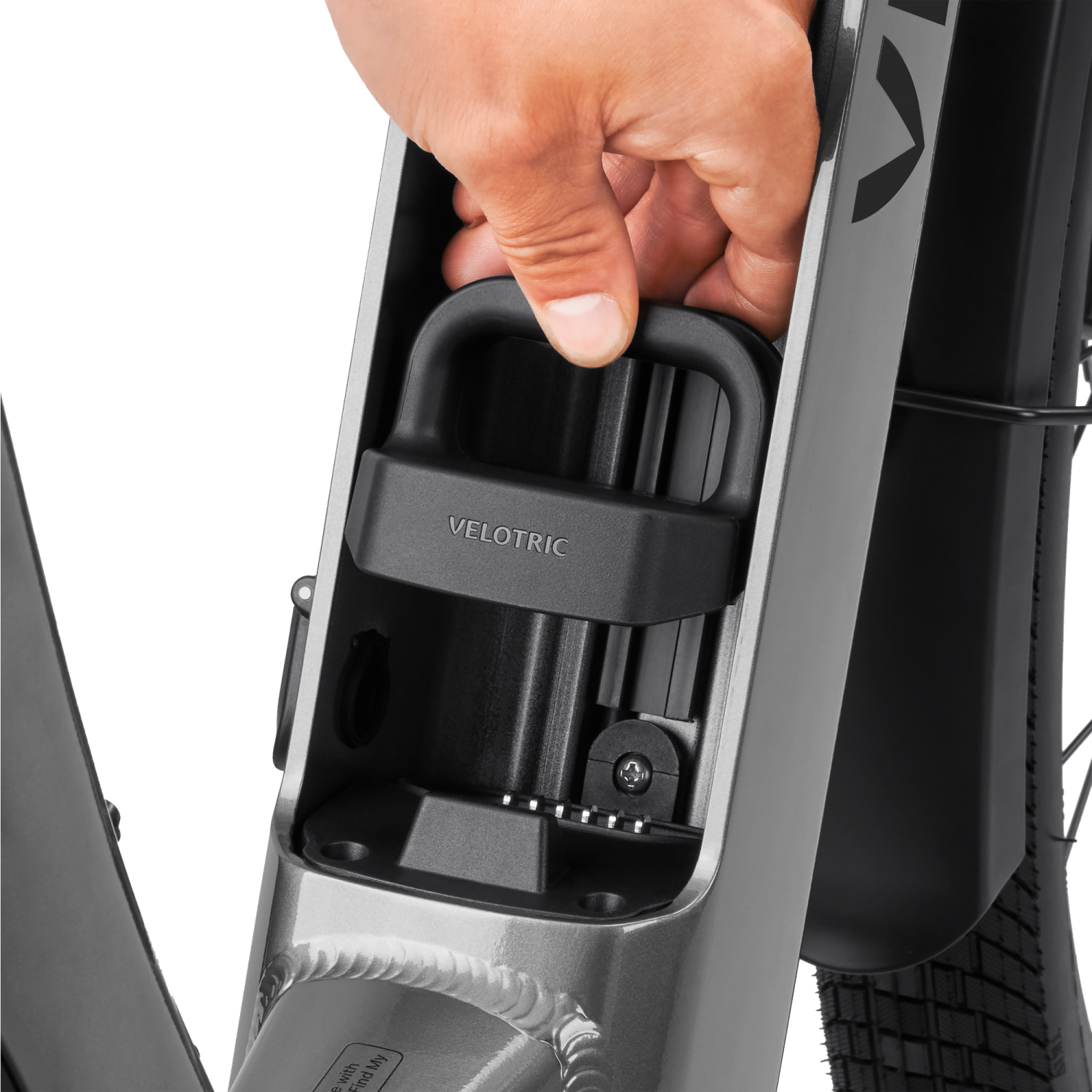 Hand showing Velotric battery terminal cover installation in e-bike frame