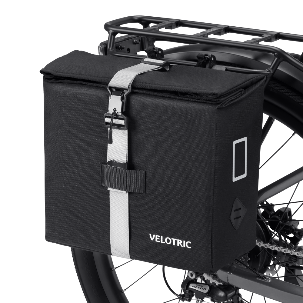 Velotric black Rear Rack Pannier Bag with detachable strap attached to bike rack