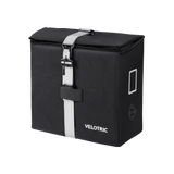 Black Velotric pannier bag with adjustable strap for bicycle rear rack storage.