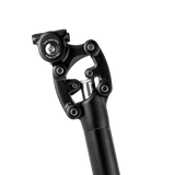 Velotric Suspension Seatpost 1.0 detail with adjustment knob and spring mechanism