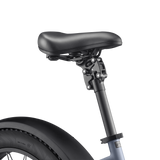 Close-up of Velotric Suspension Seatpost showing ergonomic design and shock absorption features.