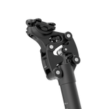 Close-up of Velotric Suspension Seatpost for smooth ride cushioning