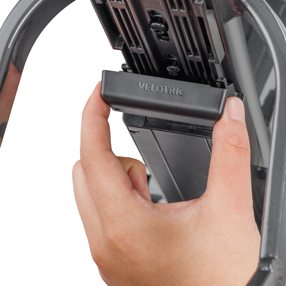 Attaching Velotric battery connector cover to Fold 1 e-bike for protection.