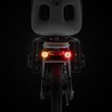 Lumos Firefly Smart Light Bundle mounted on a bicycle with yellow, white, and red lights