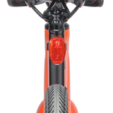 Battery-powered red rear light for Velotric e-bikes, easy to install.