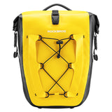 Yellow ROCKBROS waterproof bicycle saddlebag with bungee cords for cycling adventures.