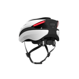 Side view of Lumos Ultra Standard Helmet in black and white with rear safety light.