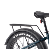 Rear rack attachment on Velotric Nomad 1 bike for carrying gear.