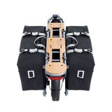 Top view of Velotric Packer Pannier Bag attached to bike, featuring a wooden rack.