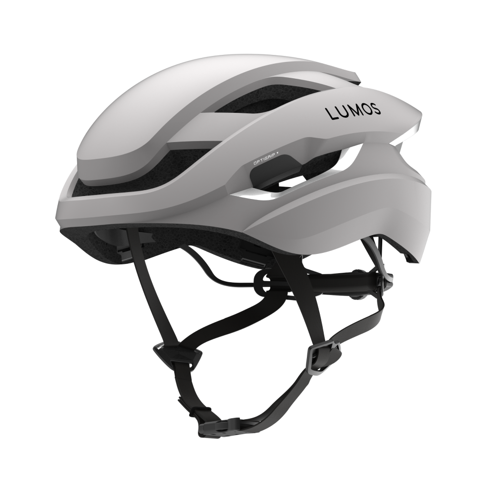 Lumos Ultra Fly helmet in white with smart lighting and adjustable fit.